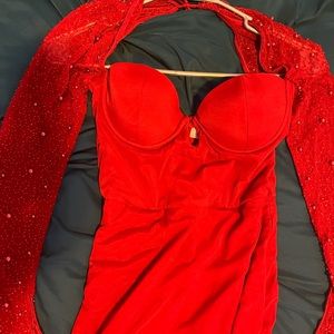 This is a long red dress with a high slit.